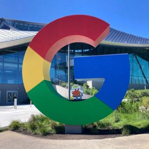 3D model of google logo in front of building