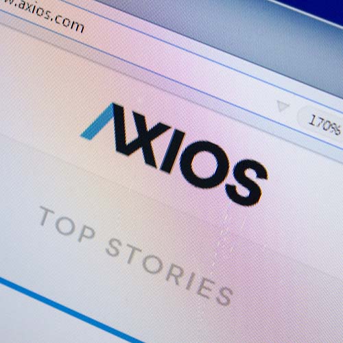 Homepage of Axios website on the display of PC