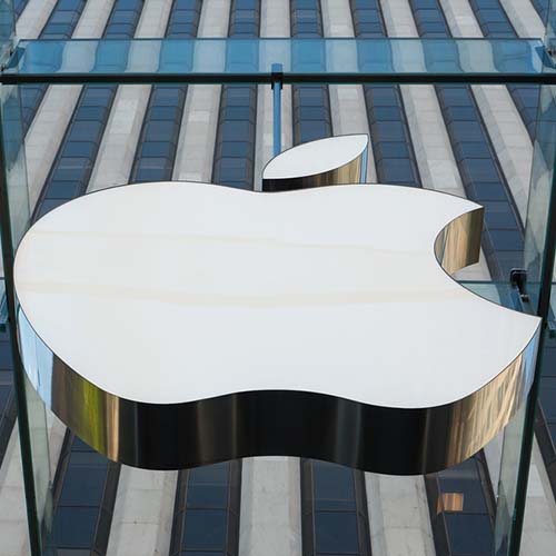 Apple logo on side of a building
