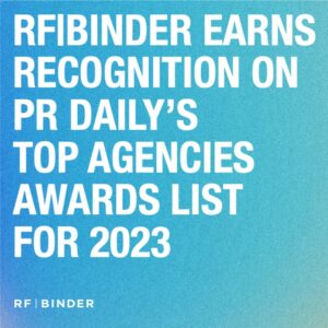 The text "RF|BINDER EARNS RECOGNITION ON PR DAILY’S TOP AGENCIES AWARDS LIST FOR 2023" over a blue gradient background