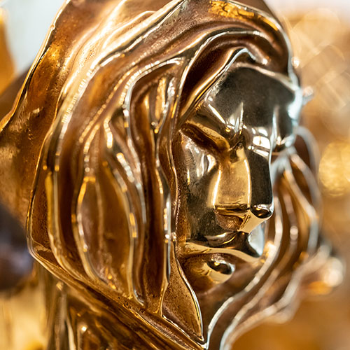 Close up of gold Cannes lion award from yearly festival in Cannes, France.